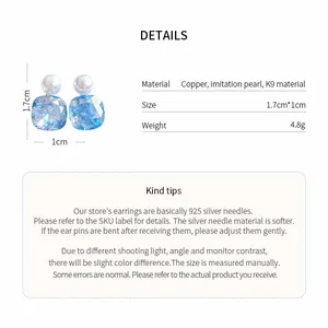 Detail showing blue square glass pearl stud earrings with 1.7cm height and material specs