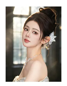 Elegant lace crystal butterfly ear cuff and matching necklace set shown on a model