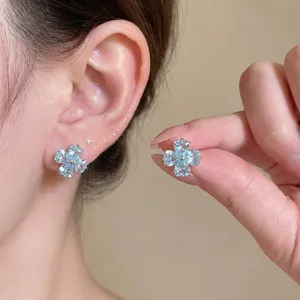 Exquisite light blue zircon flower stud earrings with an elegant and minimalist design