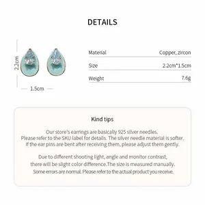 Detailed view of light blue teardrop zircon earrings with size and material info