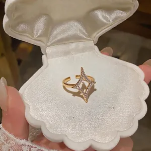 Elegant 18k gold plated adjustable ring featuring a zircon encrusted North Star