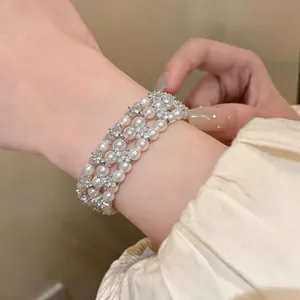 Bracciale di perle multifilo con distanziatori in strass, elegante gioiello stile vintage