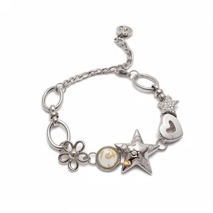 Elegant silver-toned charm bracelet with sparkling crystal star flower and heart pendants
