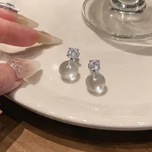 Elegant French silver needle stud earrings with resin round ball and zirconia detail