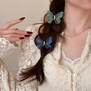Vintage knitted butterfly hair clips for women with elegant embroidered texture details
