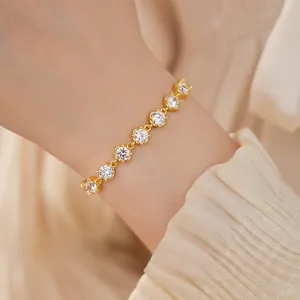 Elegant 18k gold plated bracelet featuring round cubic zirconia worn on a wrist