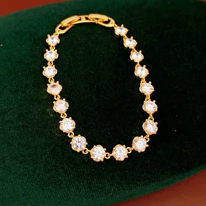 Detail view of 18k gold plated bracelet with sparkling round cubic zirconia