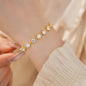 Close-up view of an elegant 18k gold plated bracelet featuring brilliant round cubic zirconia
