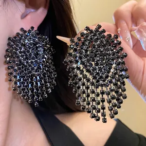 Glamorous black rhinestone tassel earrings with geometric silver needle design
