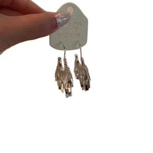Elegant silver sequin tassel fringe drop earrings for women in a minimalist modern style.