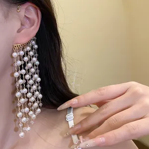 Elegant long pearl tassel ear cuff jewelry featuring vintage gold-tone finish details