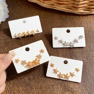 Elegant zircon starfish and floral stud earrings set for women, gold and silver finish