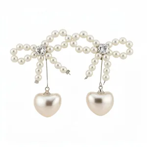 Elegant bow and heart pearl drop earrings with sparkling zircon centers for women