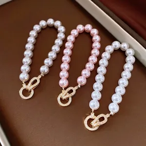 Elegant French retro zircon pearl bracelets in white and pink with gold clasp details