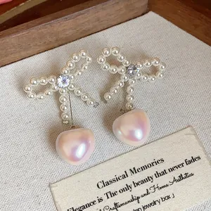 Elegant French style bow-knot stud earrings with zircon and heart-shaped pearl drop