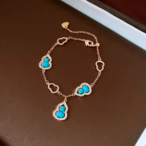 Elegante bracciale placcato oro con zucche turchesi e cuori in zircone in stile vintage