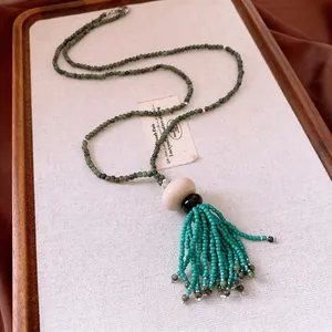 Handmade vintage ethnic style glass bead necklace with turquoise resin tassel pendant