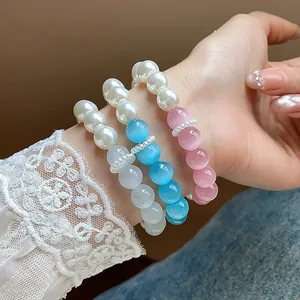 Elegant pearl bracelet set with colorful cat's eye beads for a fresh and trendy look
