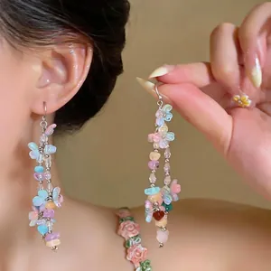 Colorful resin flower and beaded tassel earrings in vibrant dopamine style for women