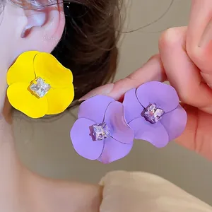 Large matte yellow and purple flower stud earrings with central crystal for island resort style