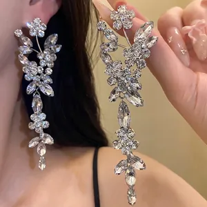 Sparkling silver needle rhinestone flower tassel earrings with luxury aesthetic