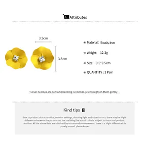 Yellow flower stud earrings with crystals and product specifications detail