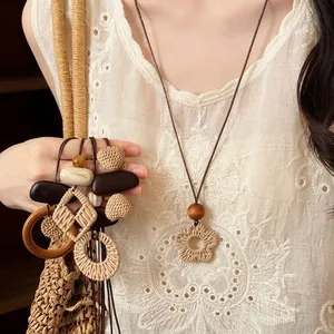 Bohemian Woven Flower Pendant Necklace Vintage Ethnic Handmade Wood Resin Bead Long Necklace For Women Summer Beach Vacation Jewelry