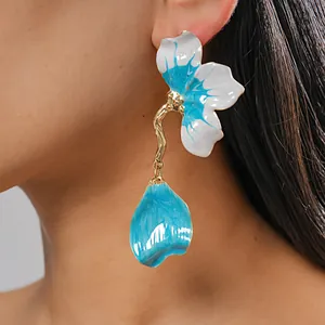 Elegant blue and white enamel flower drop earring featuring a gold-tone metallic stem for women