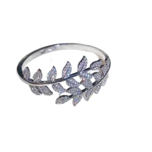 Elegant silver-toned leaf ring encrusted with sparkling cubic zirconia stones