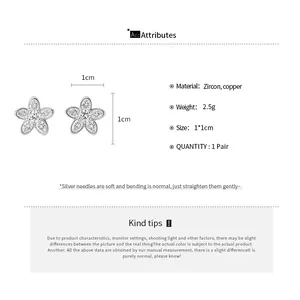 Detail view of 1cm zircon flower stud earrings with material and weight specifications.