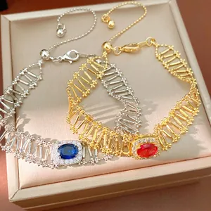 Elegantes pulseras caladas de circonita ovalada en oro y plata con cadena ajustable