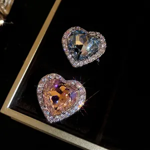 Exquisite heart-shaped zircon open rings in blue and champagne tones for a luxury look
