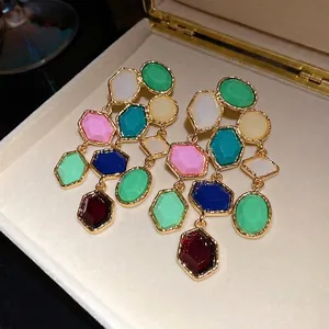 Vintage gold-tone multi-color resin stone tassel earrings with geometric shapes