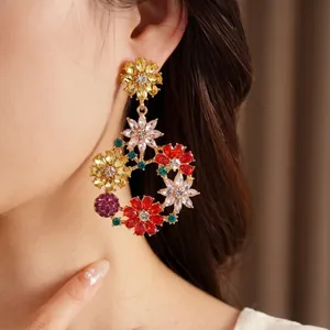 Elegant vintage flower wreath dangle earrings with colorful rhinestones on Asian model