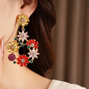 Macro detail of vintage floral round earrings with colorful rhinestones on an Asian model.