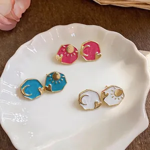 Asymmetric drip oil heart stud earrings featuring sun and moon patterns in multiple colors