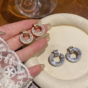 Elegant 18k gold plated round zircon stud earrings for women with luxury high-end design