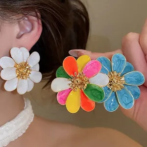 Stylish enamel flower stud earrings in white, blue, and multicolor variants for elegant women