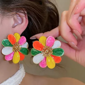Large vibrant multi-color enamel flower stud earrings with polished gold-tone accents