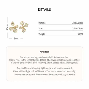Detailed specifications of gold-tone floral stud earrings with sparkling glass petals