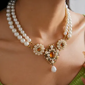 Elegant vintage baroque double-layer pearl necklace with amber-like floral accents
