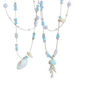 Summer ocean beach shell beaded necklace with light blue pearls and jellyfish pendant
