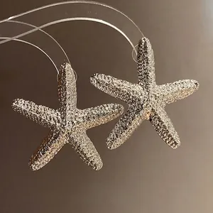 Sparkling vintage textured starfish stud earrings with silver needles for women