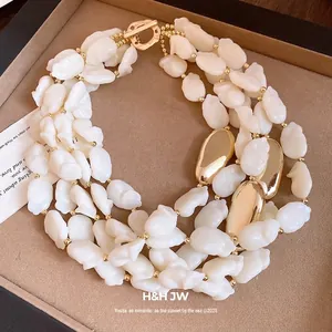 Elegant French vintage multi-layer white acrylic bead necklace with gold-tone OT clasp