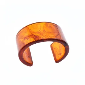 Vintage resin marbled amber open cuff bangle with chunky geometric wide retro design