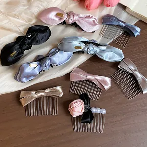 Assortment of elegant satin bow hair clips and decorative combs in soft, lovely colors