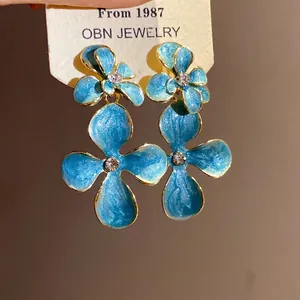 Elegant vintage silver needle blue flower drop earrings with rhinestones and enamel finish