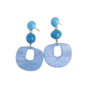 Stylish blue acrylic oval dangle earrings with silver needles for a chic refreshing look