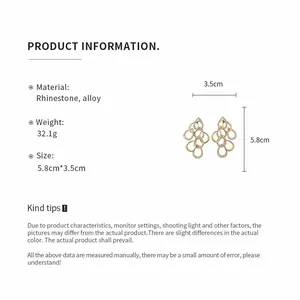 Detail view of rhinestone twisted teardrop earrings with size and material specifications