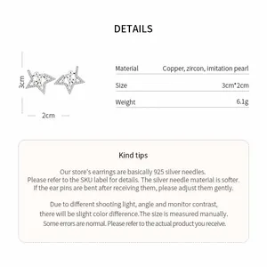 Macro detail of zircon star earrings with measurements and product specifications